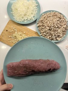pork-wellington-with-mushroom-duxelle prepping the porl