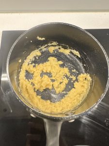 mixing melted butter and flour