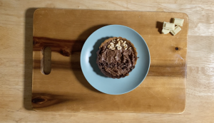 Decorating with hazelnuts and cocoa nibs