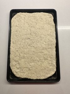 onto a baking tray or pizza stone.