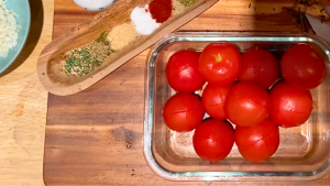 Score-the-tomatoes-and-add-hot-water.-Gently-peel-them-using-a-knife.png