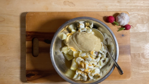 adding-the-healthy-mayo-to-the-salad.png