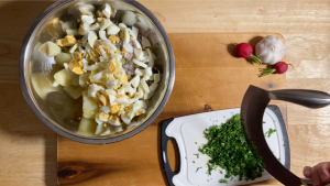 chopping-the-parsley-for-potato-salad.png