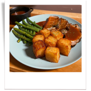 Sunday Roast Reimagined: Crispy Layered Potatoes with Pork Loin and Red Wine Sauce