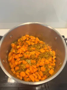 mixing in the carrots